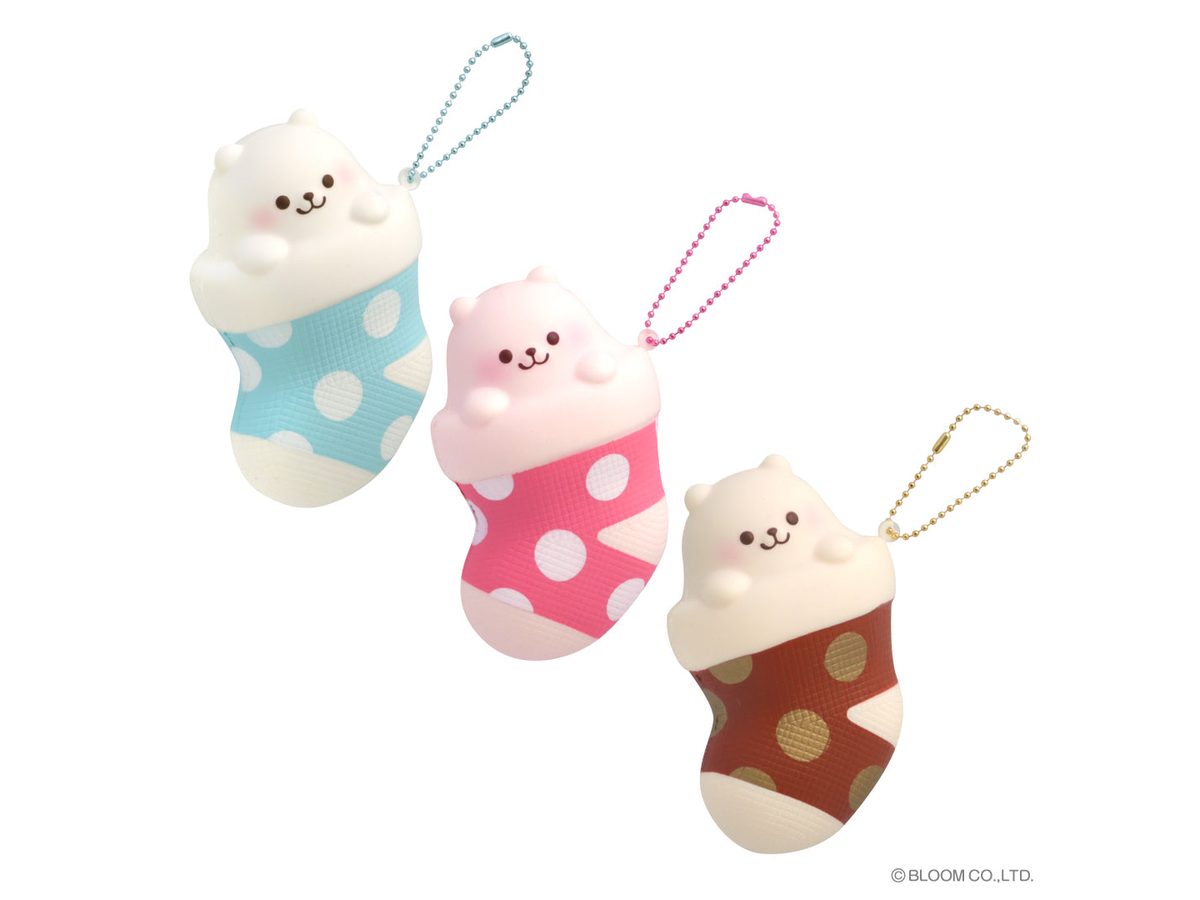 Three sock squishy keychains